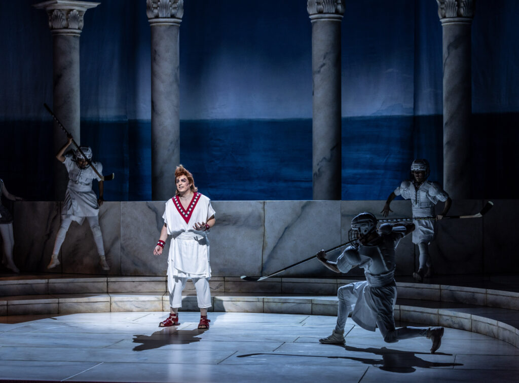 Licida är omringad av tre hockeyspelare.